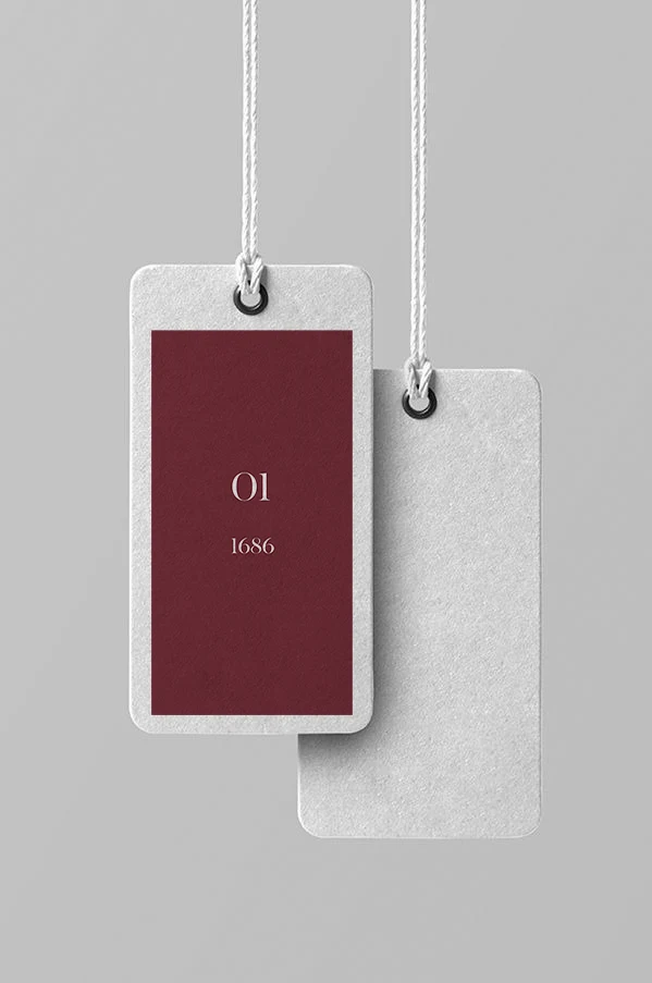 Hang tag in maroon reading 01, 1686