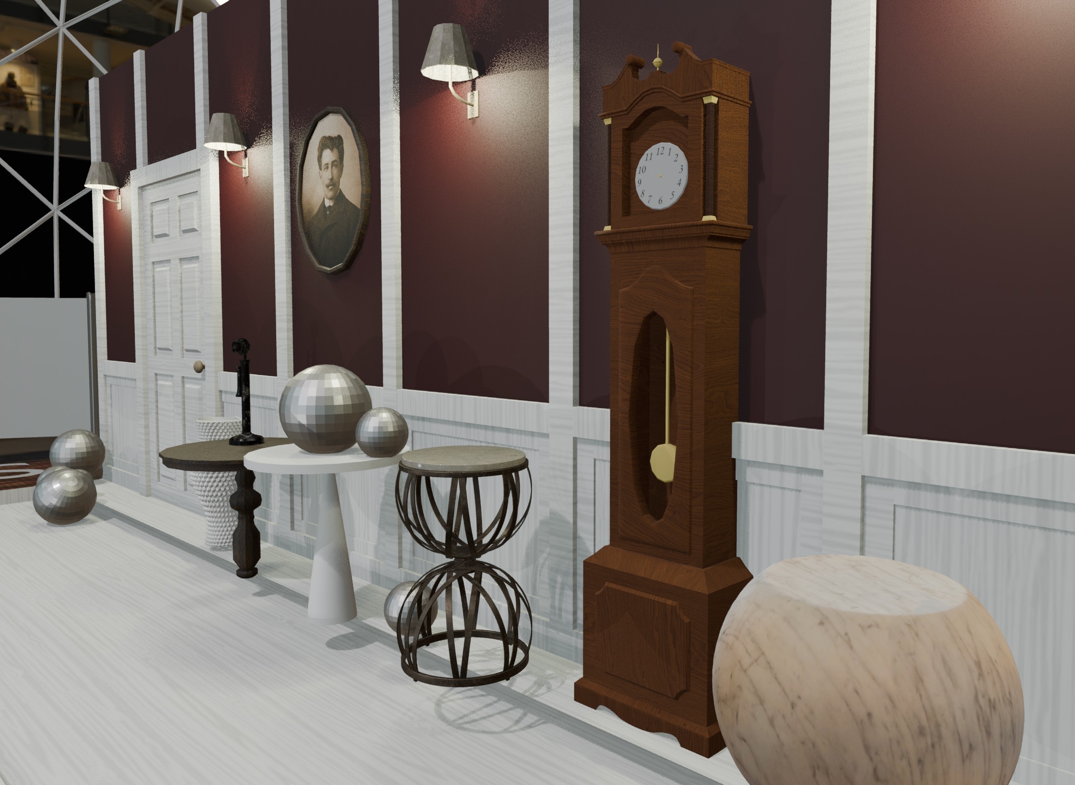 Close view of the heritage wall with maroon panels, wall lamps, an oval portrait, a grandfather clock, side tables and mirrored spheres